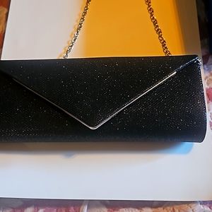 Black no name evening clutch